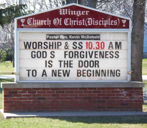 Church sign: GOD S FORGIVENESS IS THE DOOR TO A NEW BEGINNING